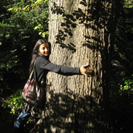 Loveleen hugging Sandra's Tree
